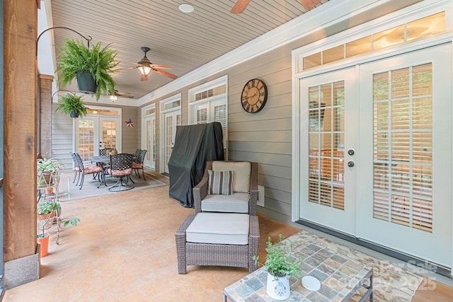 view of patio featuring ceiling fan, french doors, and outdoor dining space
