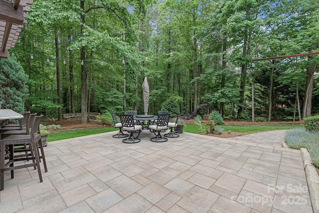 view of patio with outdoor dining area