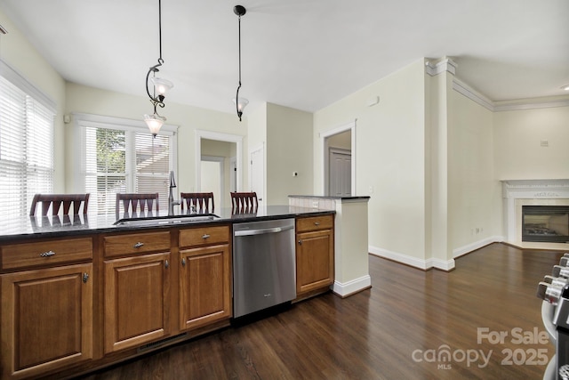 1855 Second Baxter Xing, Fort Mill, SC 29708 - kitchen with stainless steel appliances, a sink, dark wood-type flooring, brown cabinetry, and hanging light fixtures