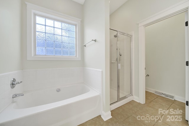 1855 Second Baxter Xing, Fort Mill, SC 29708 - bathroom featuring a stall shower, tile patterned floors, and a garden tub
