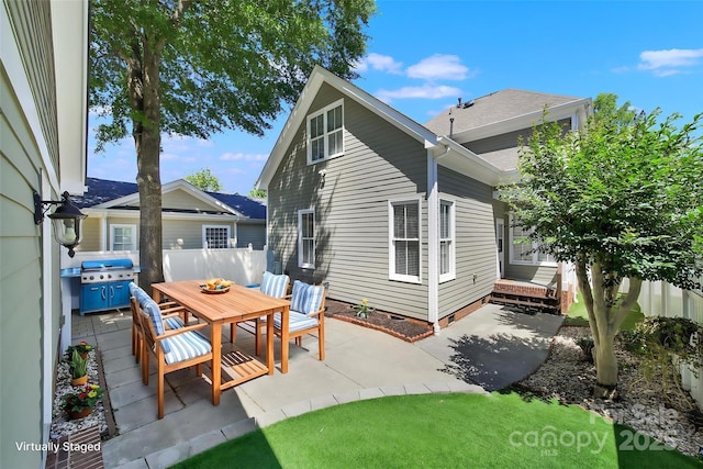 1855 Second Baxter Xing, Fort Mill, SC 29708 - rear view of property featuring crawl space, a patio, outdoor dining area, and fence