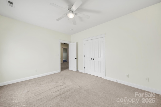 1855 Second Baxter Xing, Fort Mill, SC 29708 - unfurnished bedroom with carpet flooring, baseboards, a closet, and a ceiling fan