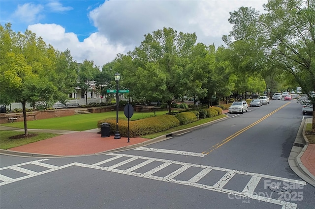 1855 Second Baxter Xing, Fort Mill, SC 29708 - view of asphalt street featuring curbs, traffic signs, and sidewalks