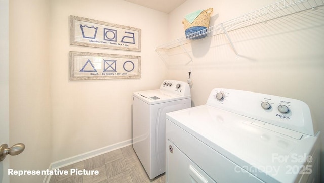 129 Way Cross Ln, Troutman, NC 28166 - washroom with washing machine and dryer and baseboards