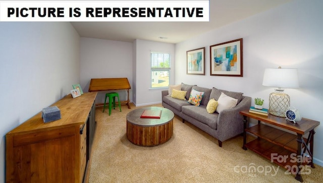 living area with baseboards and light colored carpet