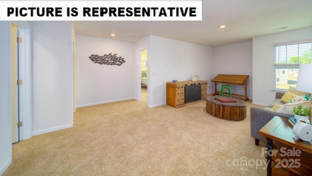 sitting room featuring carpet flooring, recessed lighting, baseboards, and visible vents