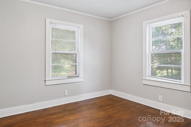 130 Casper Rd, Gold Hill, NC 28071 - spare room with baseboards, ornamental molding, and dark wood-style flooring