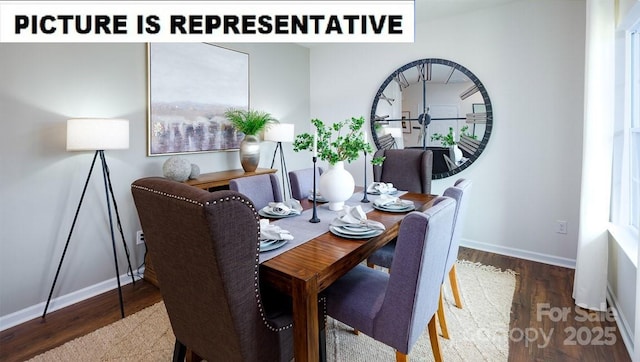 dining area with baseboards and wood finished floors