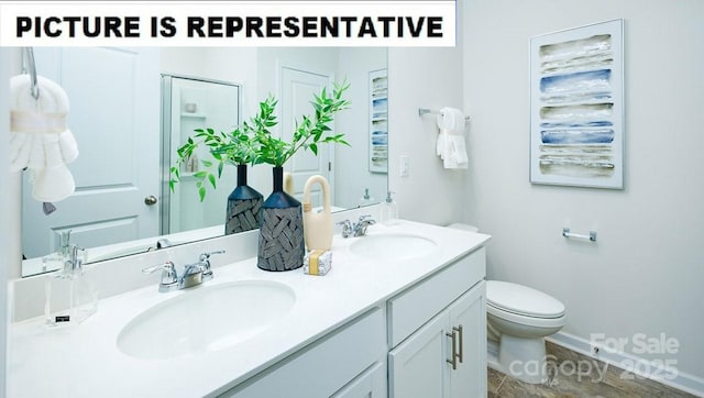 bathroom with toilet, double vanity, and a shower with shower door
