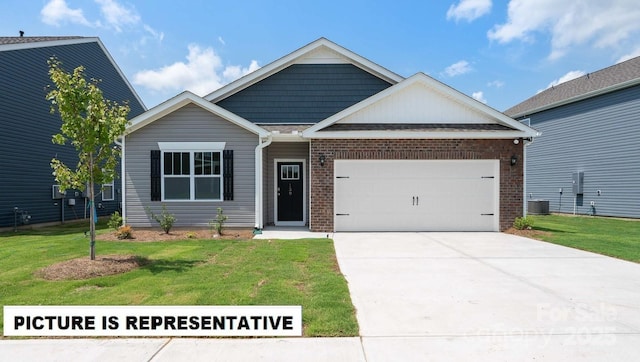 view of front facade featuring an attached garage, a front lawn, brick siding, cooling unit, and driveway