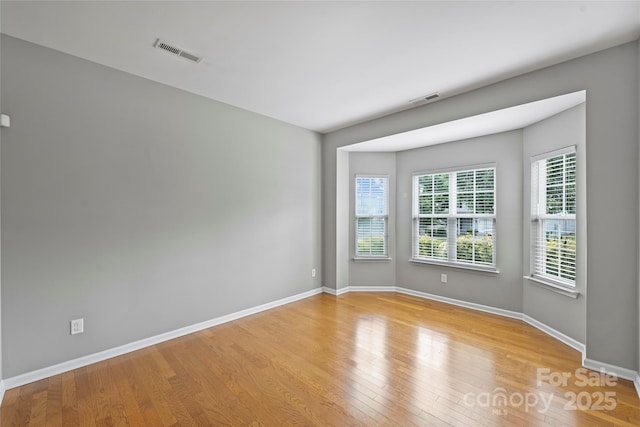 9321 Bradstreet Commons Way, Charlotte, NC 28215 - unfurnished room with wood finished floors and baseboards