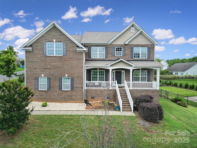 9029 Woodview Ct, Fort Mill, SC 29707 - traditional-style home with brick siding, stairway, and a porch