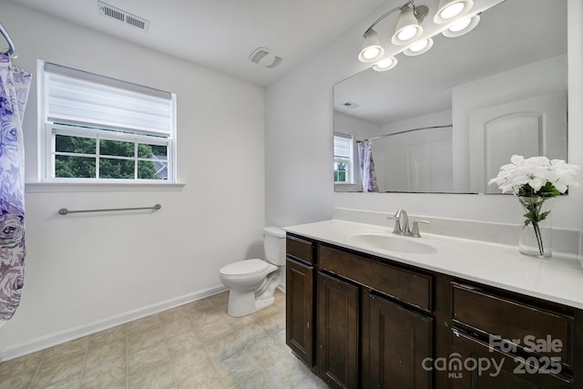 9029 Woodview Ct, Fort Mill, SC 29707 - bathroom with vanity, toilet, baseboards, and a shower with shower curtain