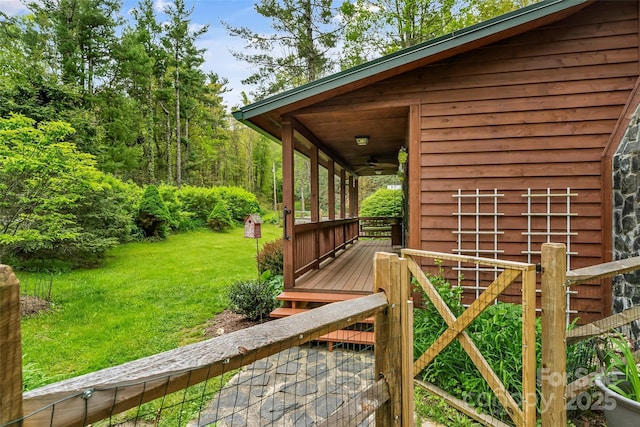 6562 Gingercake Rd, Newland, NC 28657 - deck featuring a lawn and ceiling fan