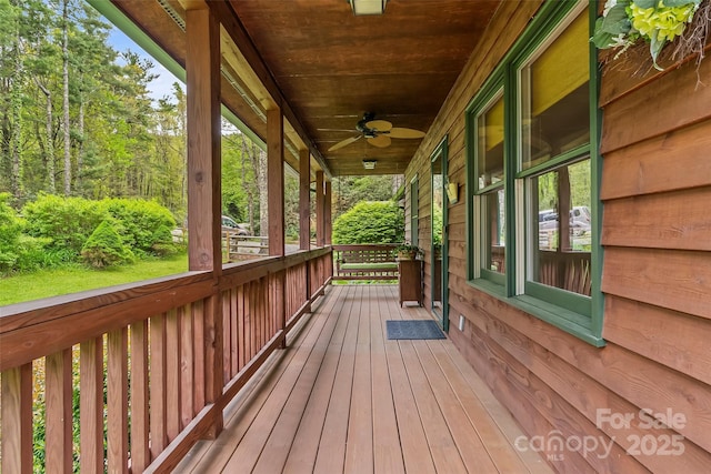 6562 Gingercake Rd, Newland, NC 28657 - deck featuring a ceiling fan and a porch