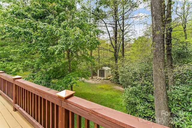 6562 Gingercake Rd, Newland, NC 28657 - deck featuring a storage shed, an outbuilding, and a yard