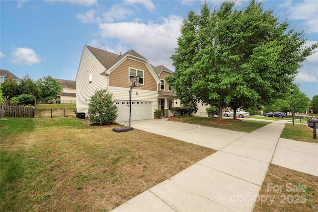 9159 Marasol Ln, Concord, NC 28027 - view of front of house with concrete driveway, fence, an attached garage, and a front lawn