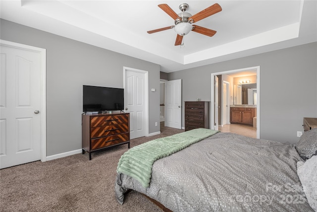 9159 Marasol Ln, Concord, NC 28027 - bedroom featuring a raised ceiling, carpet, baseboards, a ceiling fan, and connected bathroom
