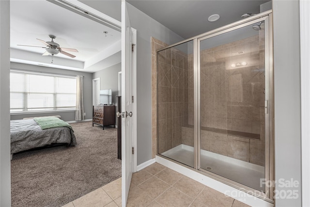 9159 Marasol Ln, Concord, NC 28027 - ensuite bathroom with a stall shower, tile patterned floors, baseboards, and a ceiling fan