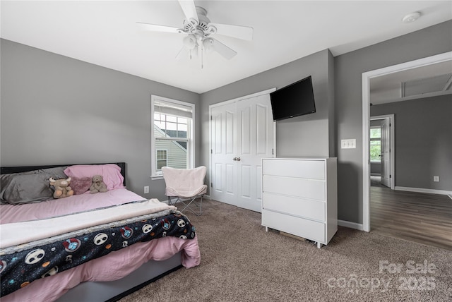 9159 Marasol Ln, Concord, NC 28027 - bedroom featuring multiple windows, carpet floors, a closet, and baseboards