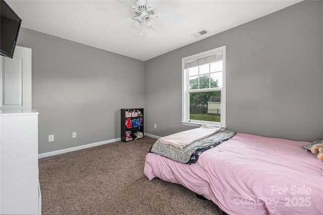 9159 Marasol Ln, Concord, NC 28027 - bedroom with carpet floors, baseboards, and a ceiling fan