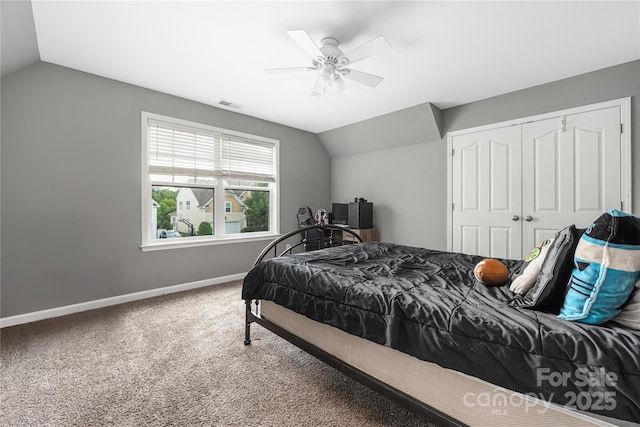 9159 Marasol Ln, Concord, NC 28027 - carpeted bedroom with vaulted ceiling, baseboards, a closet, and a ceiling fan