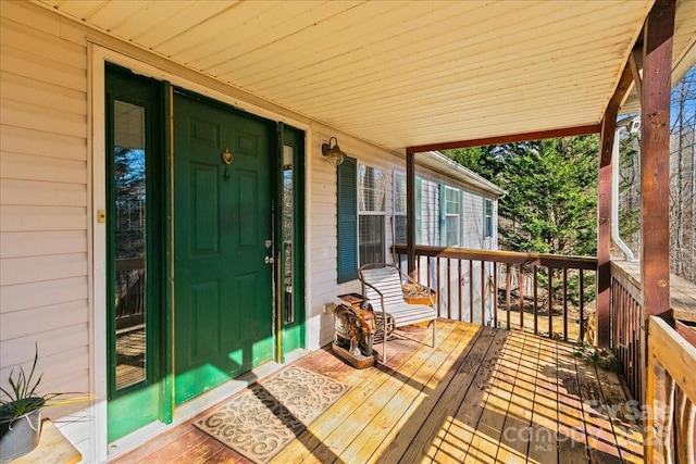 wooden deck featuring a porch