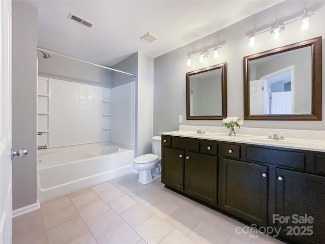 bathroom featuring toilet, double vanity, bathtub / shower combination, and tile patterned flooring