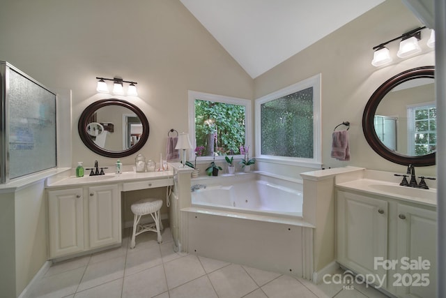160 Fernbrook Dr, Mooresville, NC 28117 - full bathroom featuring lofted ceiling, a whirlpool tub, tile patterned flooring, and two vanities