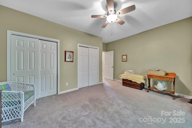 160 Fernbrook Dr, Mooresville, NC 28117 - carpeted bedroom featuring multiple closets and a ceiling fan