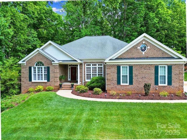 160 Fernbrook Dr, Mooresville, NC 28117 - single story home featuring a front yard and brick siding