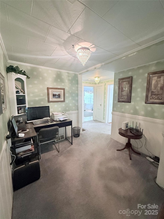 office with wallpapered walls, wainscoting, crown molding, and carpet floors
