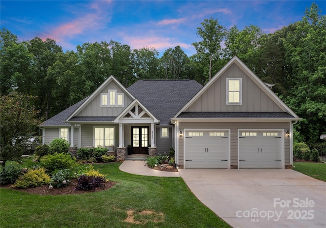 2646 Lee Lawing Rd, Lincolnton, NC 28092 - craftsman house with board and batten siding, french doors, concrete driveway, an attached garage, and a front yard