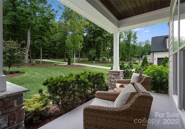 2646 Lee Lawing Rd, Lincolnton, NC 28092 - view of green lawn with covered porch and view of wooded area