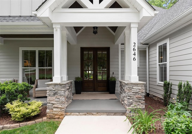 2646 Lee Lawing Rd, Lincolnton, NC 28092 - view of exterior entry with french doors, a porch, and a shingled roof