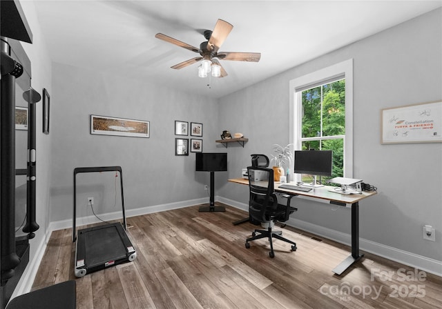 2646 Lee Lawing Rd, Lincolnton, NC 28092 - office area with wood finished floors, a ceiling fan, and baseboards