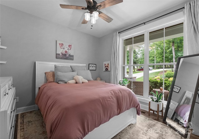 2646 Lee Lawing Rd, Lincolnton, NC 28092 - bedroom featuring light wood finished floors, ceiling fan, and baseboards
