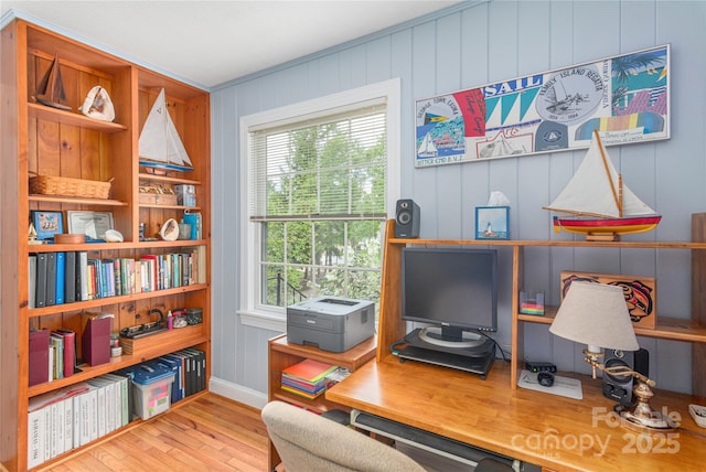 office featuring crown molding, baseboards, and wood finished floors