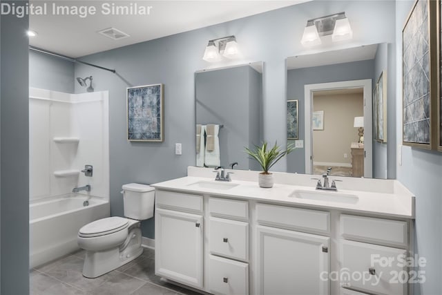full bathroom with visible vents, a sink, double vanity, and toilet