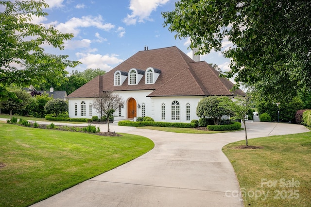 5400 Challisford Ln, Charlotte, NC 28226 - exterior space featuring curved driveway, roof with shingles, stucco siding, and a front yard