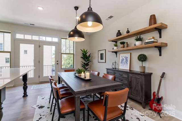 2907 W Trade St, Charlotte, NC 28208 - dining room featuring light wood-type flooring, visible vents, baseboards, and recessed lighting