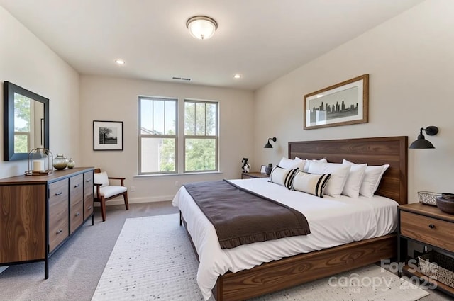 2907 W Trade St, Charlotte, NC 28208 - bedroom with recessed lighting, visible vents, baseboards, and carpet floors