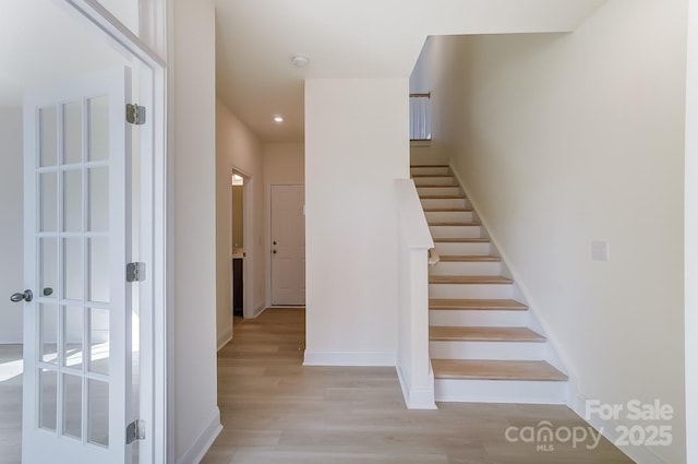 2907 W Trade St, Charlotte, NC 28208 - staircase featuring wood finished floors, baseboards, and recessed lighting
