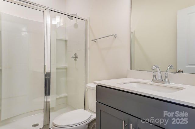 2907 W Trade St, Charlotte, NC 28208 - bathroom with vanity, toilet, and a stall shower