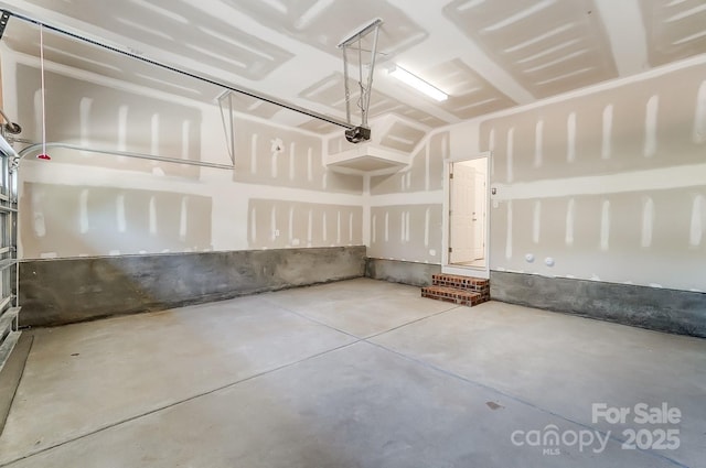 2907 W Trade St, Charlotte, NC 28208 - garage featuring a garage door opener