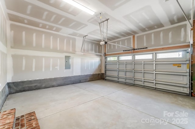 2907 W Trade St, Charlotte, NC 28208 - garage with electric panel and a garage door opener