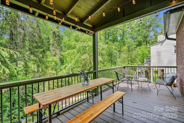 21 Sylvan Ave, Asheville, NC 28801 - deck featuring outdoor dining area and a forest view
