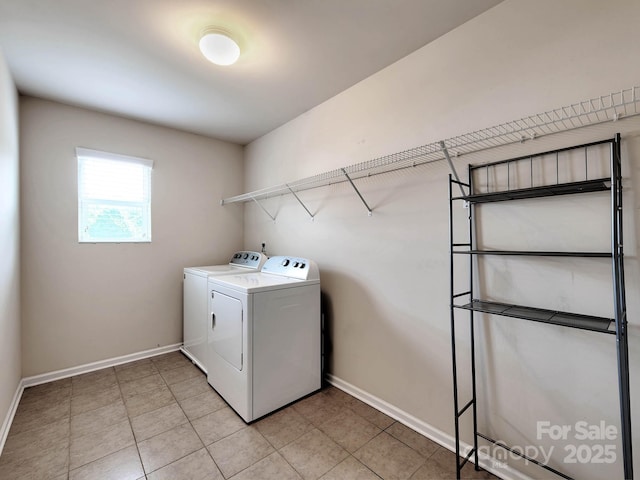 6541 Hasley Woods Dr, Huntersville, NC 28078 - laundry area featuring laundry area, baseboards, light tile patterned floors, and washer and dryer