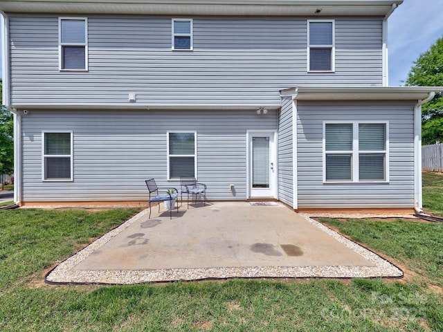 6541 Hasley Woods Dr, Huntersville, NC 28078 - back of property with a yard and a patio area