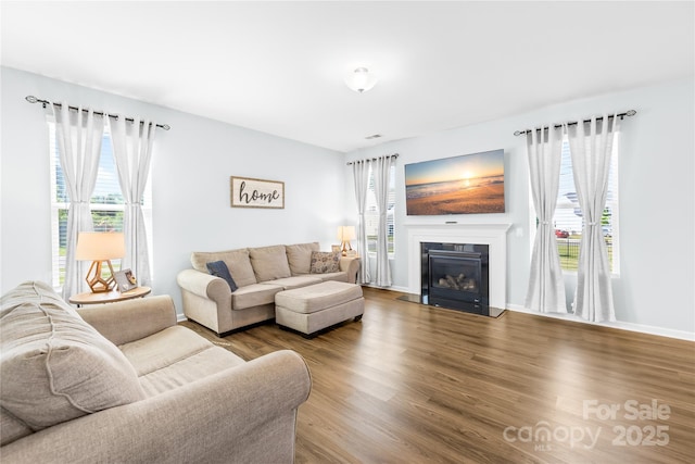 133 W Neel Ranch Rd, Mooresville, NC 28115 - living room with a fireplace with flush hearth and wood finished floors